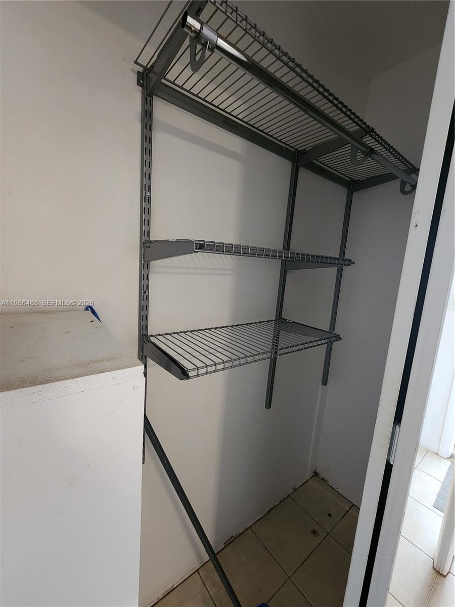 315 Walnut Street, Unit 2 Hollywood, FL 33019 - Photo 13 of 23 a view of walk in closet
