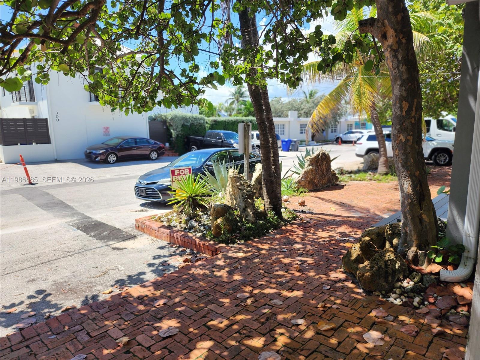 315 Walnut Street, Unit 2 Hollywood, FL 33019 - Photo 23 of 23 a view of a park with large trees