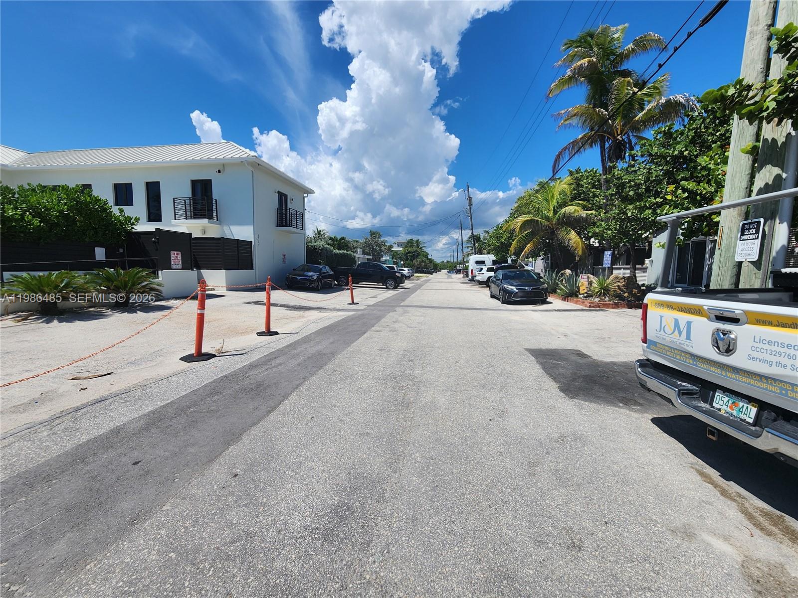 315 Walnut Street, Unit 2 Hollywood, FL 33019 - Photo 4 of 23 a view of a street with a house