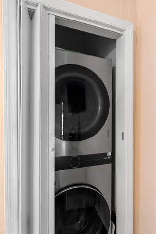 a utility room with washing machine