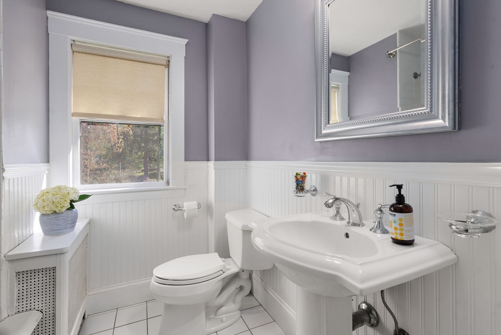 241 Weston Road Wellesley, MA 02482 - Photo 18 of 27 a bathroom with a sink and a toilet
