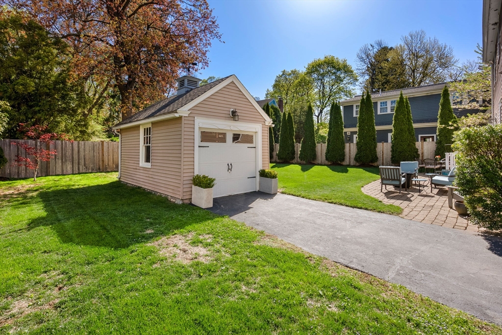 241 Weston Road Wellesley, MA 02482 - Photo 27 of 27 a view of a backyard of the house