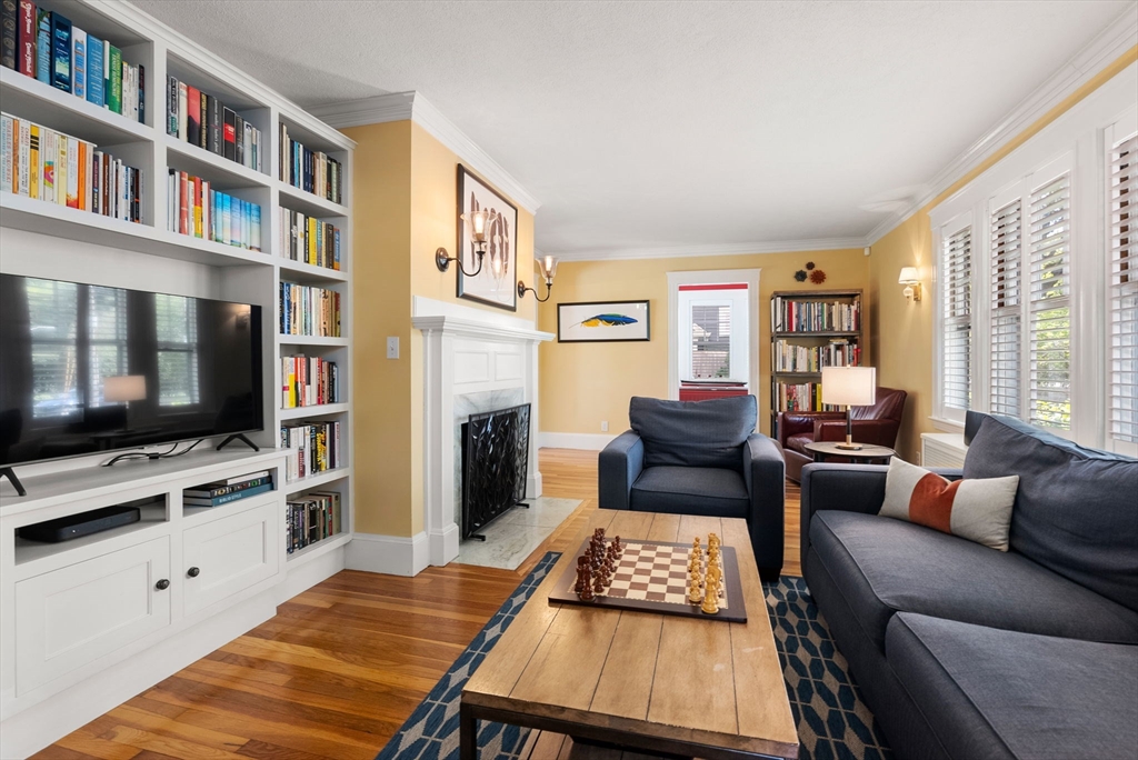 241 Weston Road Wellesley, MA 02482 - Photo 4 of 27 a living room with furniture and a flat screen tv
