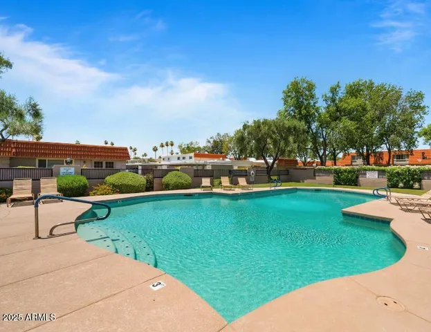 a view of a garden with houses
