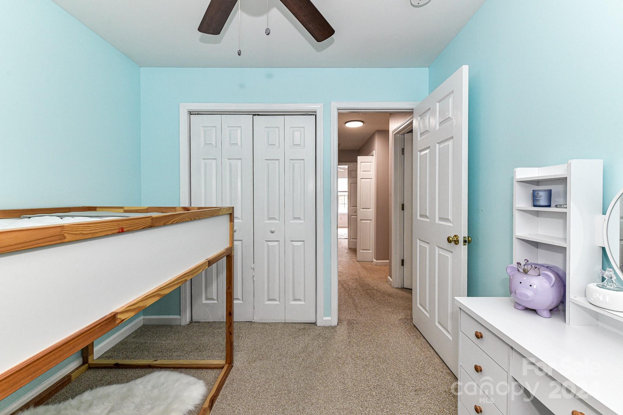 9665 Bailey Road Cornelius, NC 28031 - Photo 24 of 31 a hallway with a view of living room