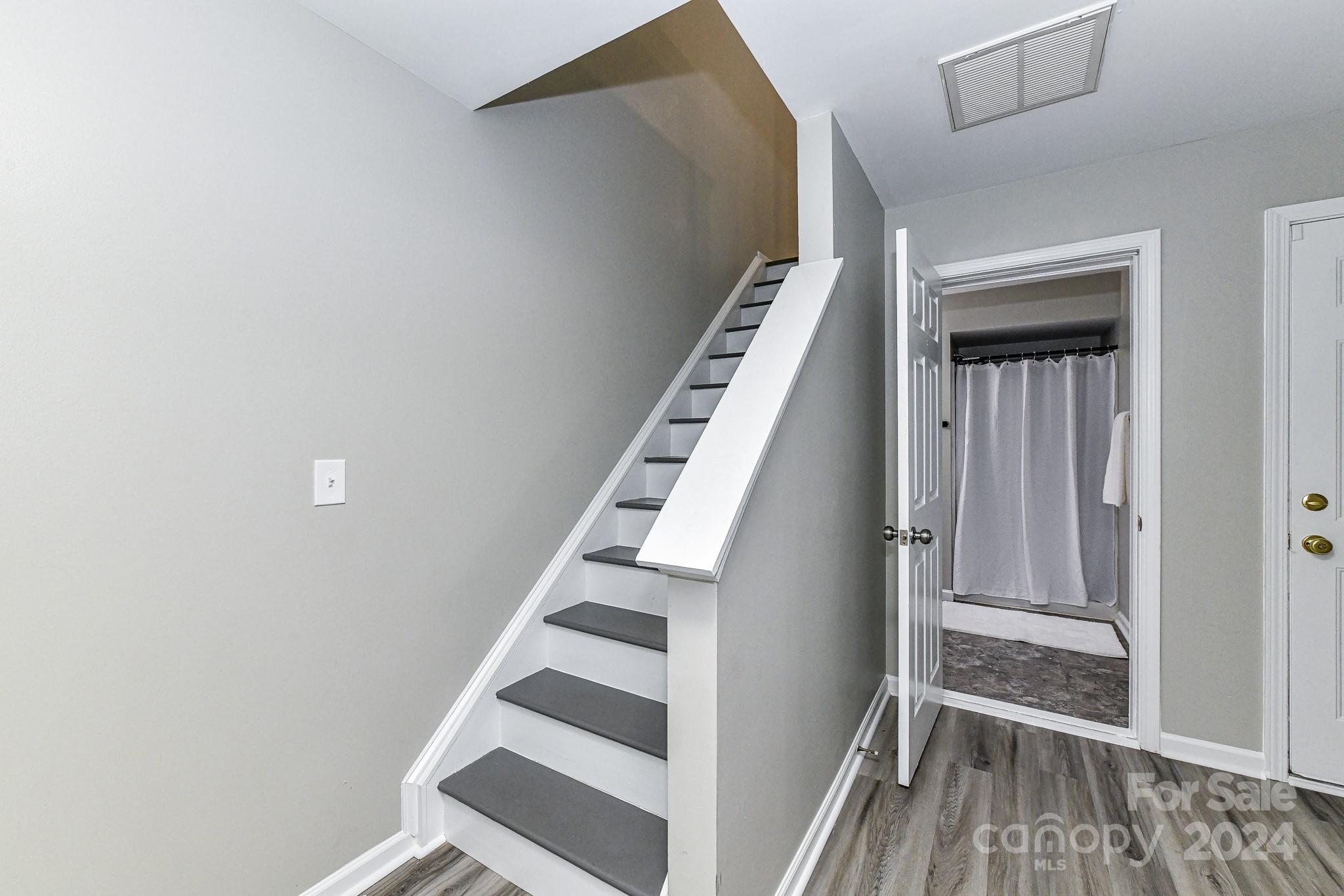 9665 Bailey Road Cornelius, NC 28031 - Photo 6 of 31 a view of an entryway with staircase