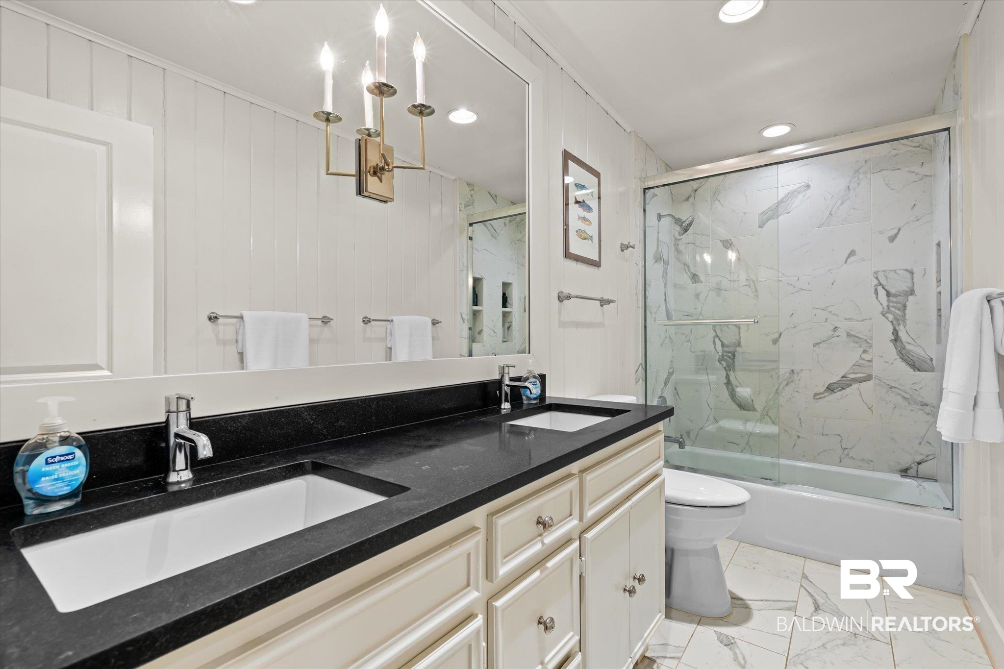3921 McGregor Court Mobile, AL 36608 - Photo 24 of 41 Full bath with a sink, toilet, marble finish floor, and combined bath / shower with glass door