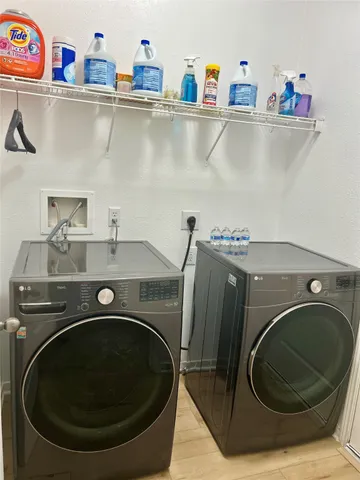 a utility room with dryer and washer