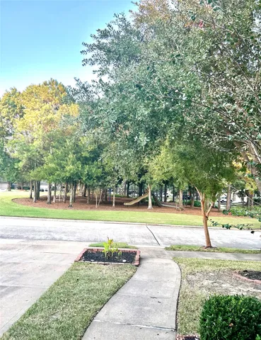 a view of a yard with an outdoor space