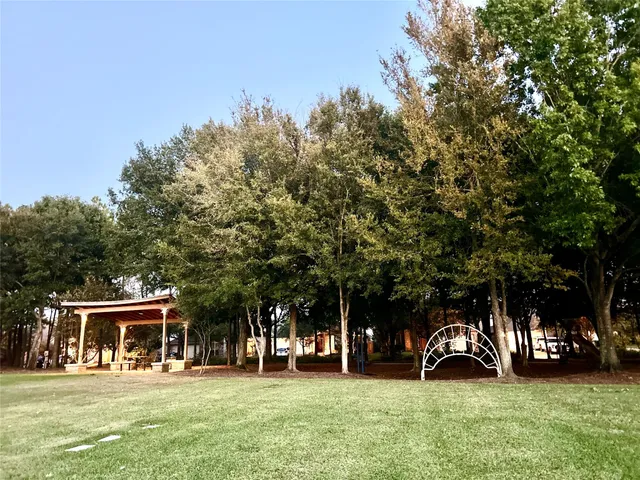 a view of a trees in front of a house