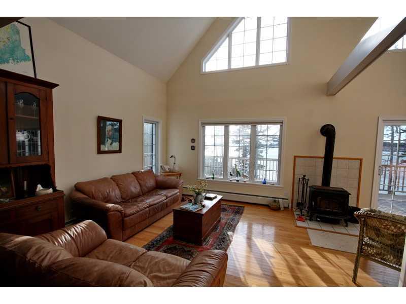 10 Pleasant River Road Addison, ME 04606 - Photo 12 of 35 Living Room. Large cathedral living...
