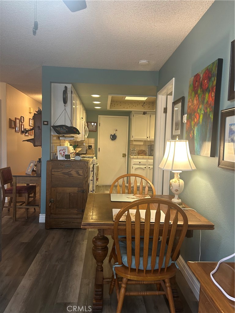 562 Bakeman Lane Arroyo Grande, CA 93420 - Photo 12 of 35 a view of a dining room with furniture and wooden floor