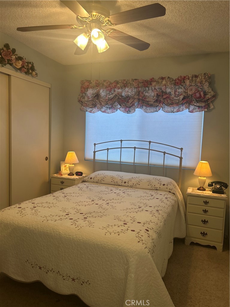 562 Bakeman Lane Arroyo Grande, CA 93420 - Photo 19 of 35 a bedroom with a bed and a window