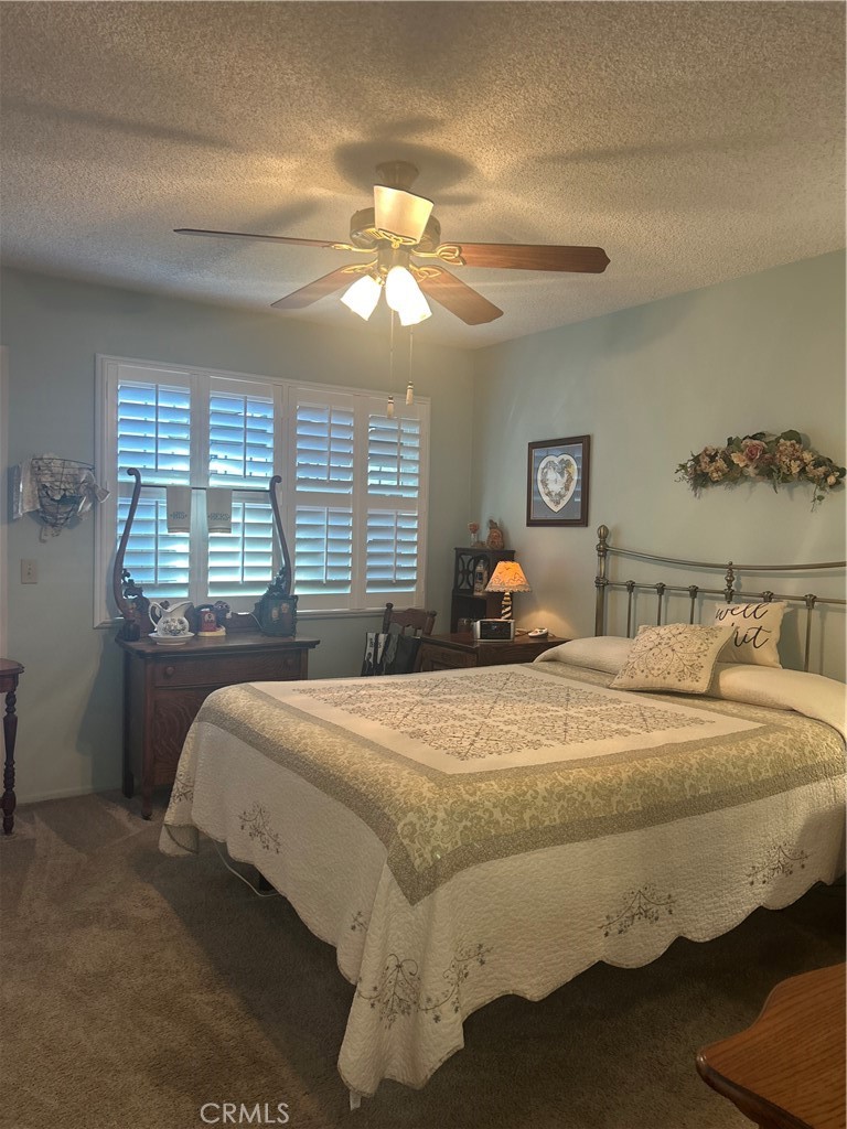 562 Bakeman Lane Arroyo Grande, CA 93420 - Photo 24 of 35 a bedroom with a bed and window