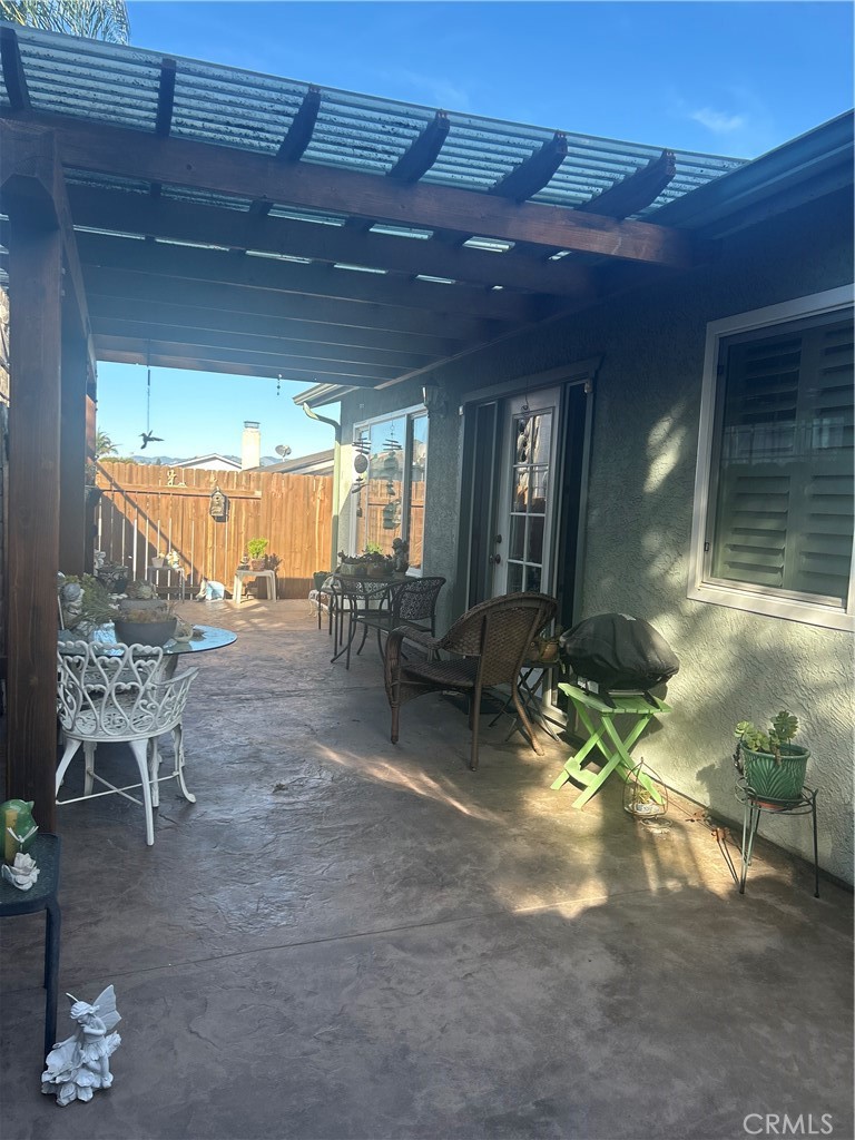 562 Bakeman Lane Arroyo Grande, CA 93420 - Photo 30 of 35 a room with lots of furniture and a chandelier
