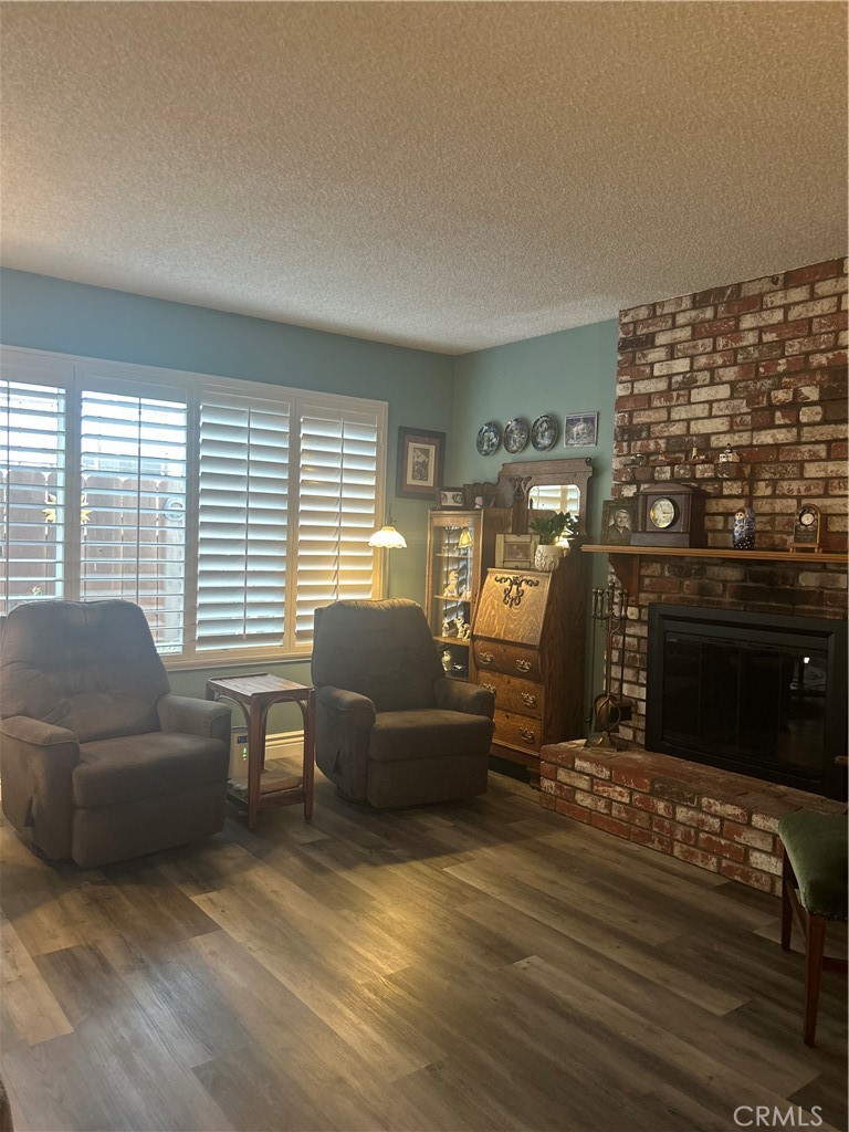 562 Bakeman Lane Arroyo Grande, CA 93420 - Photo 7 of 35 a living room with furniture and a fireplace