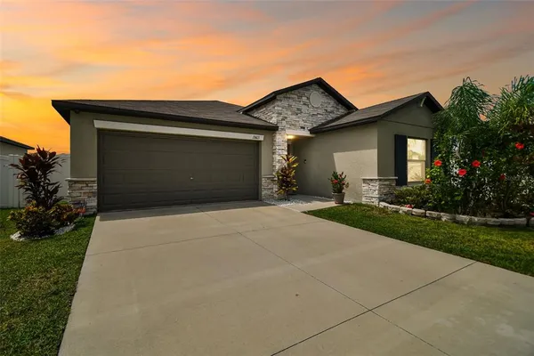 front view of a house with a yard