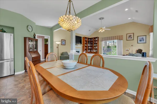 a view of a dining room with furniture