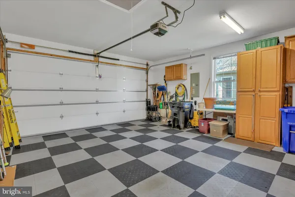 a view of a storage & utility room with a window