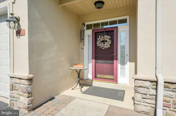 a picture of a bathroom with a sink and a mirror