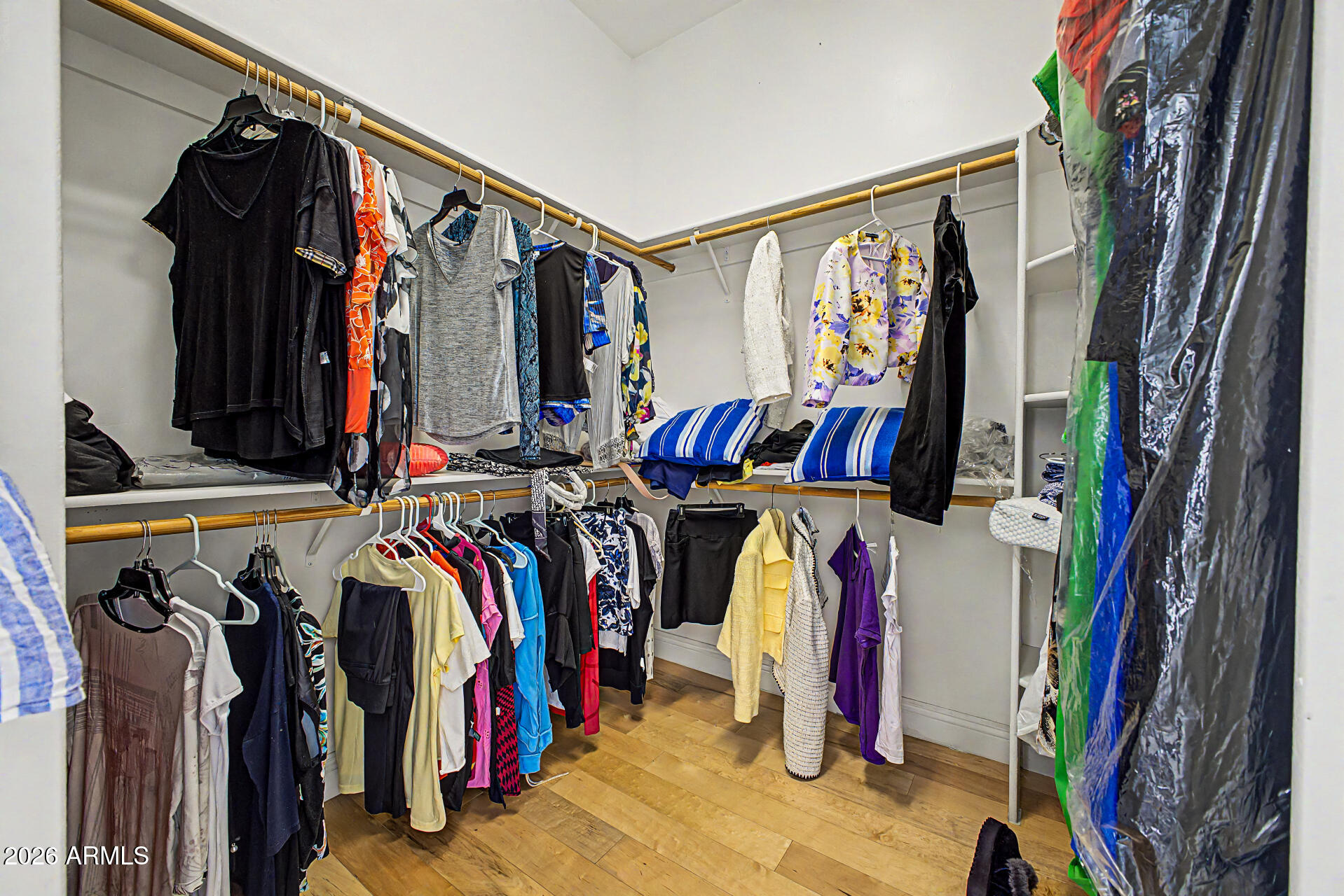 808 West Citrus Way Phoenix, AZ 85013 - Photo 19 of 35 a view of walk in closet with clothes
