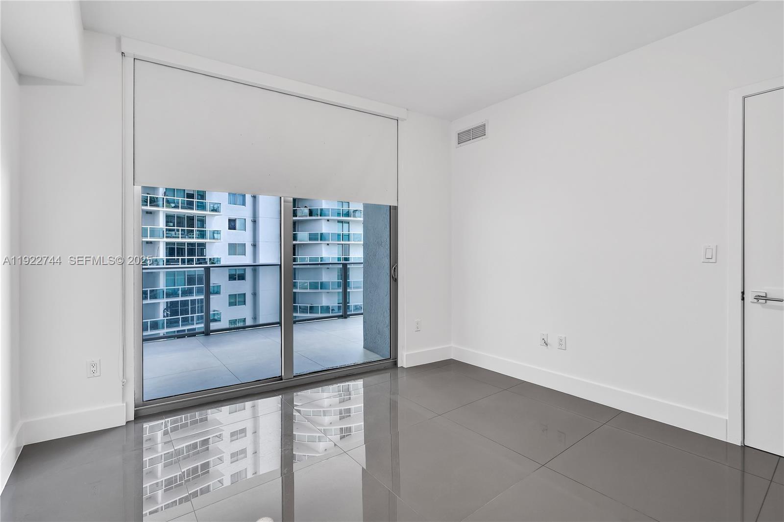 488 Northeast 18th Street, Unit 2311 Miami, FL 33132 - Photo 17 of 40 a view of an empty room