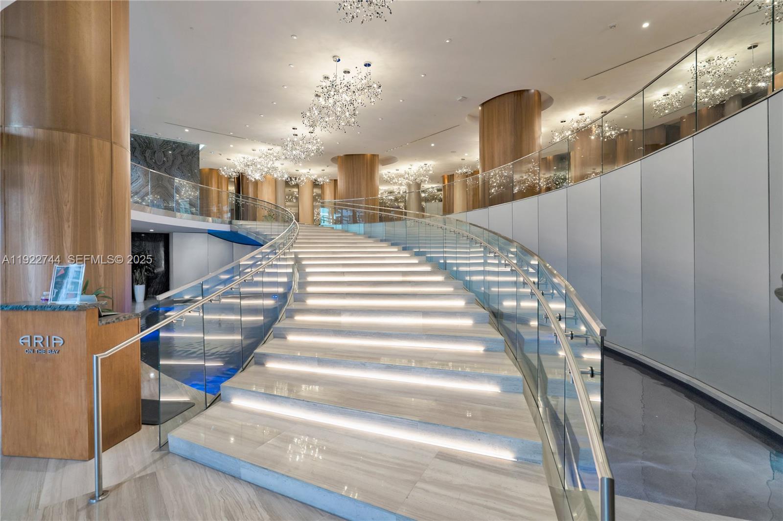 488 Northeast 18th Street, Unit 2311 Miami, FL 33132 - Photo 40 of 40 a view of a hallway with a chandelier