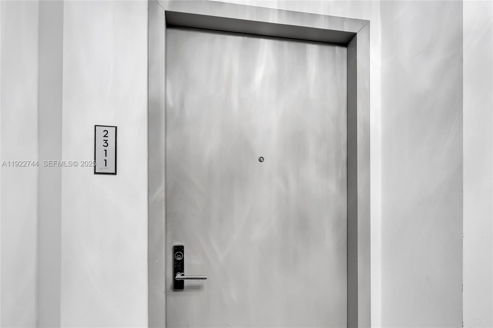 488 Northeast 18th Street, Unit 2311 Miami, FL 33132 - Photo 5 of 40 a bathroom with a shower and a mirror