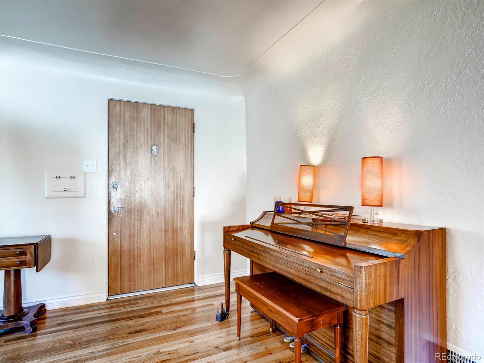 1370 Olive Street Denver, CO 80220 - Photo 4 of 27 a view of room with wooden floor