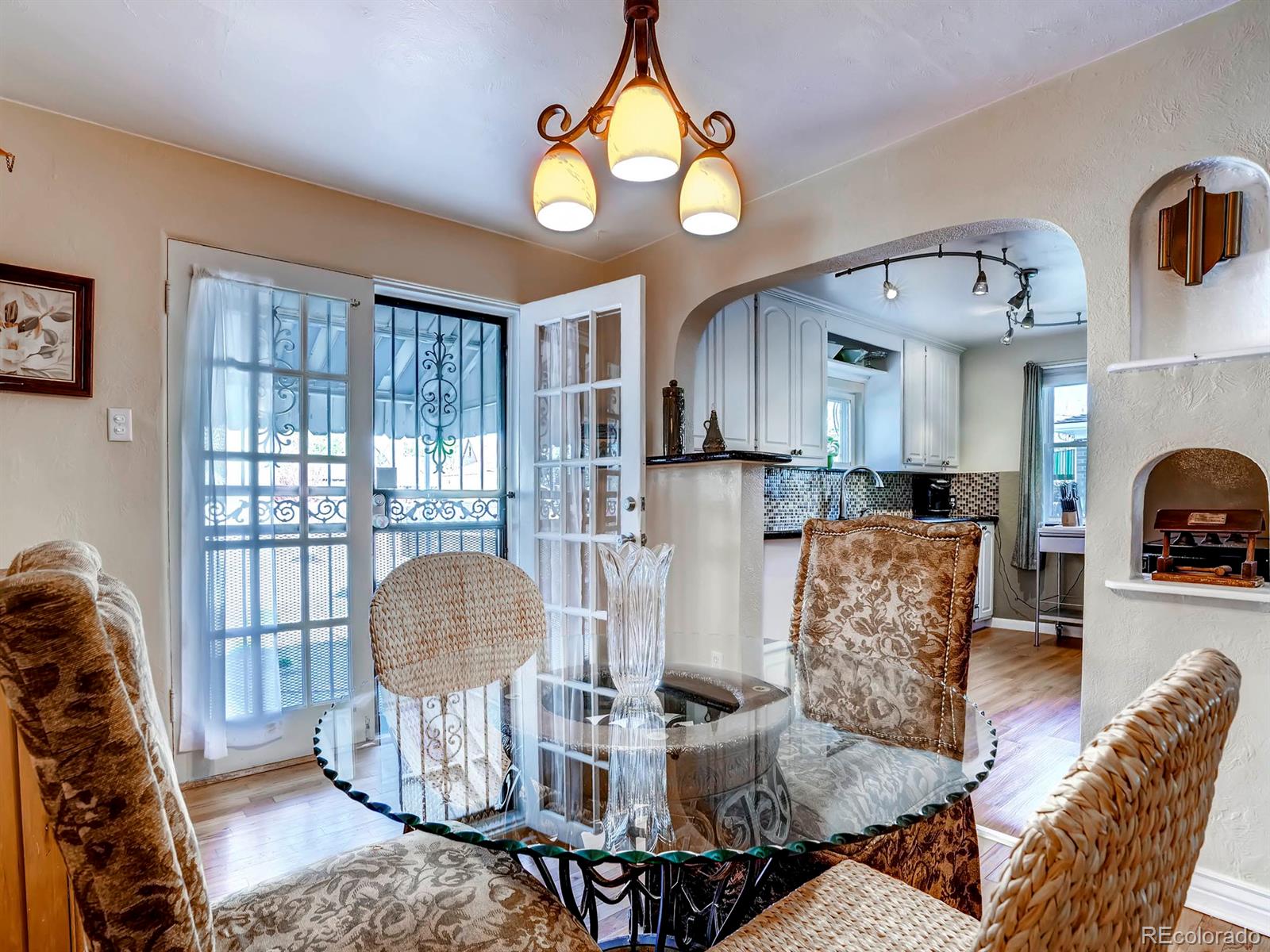 1370 Olive Street Denver, CO 80220 - Photo 5 of 27 a living room with furniture and a large window