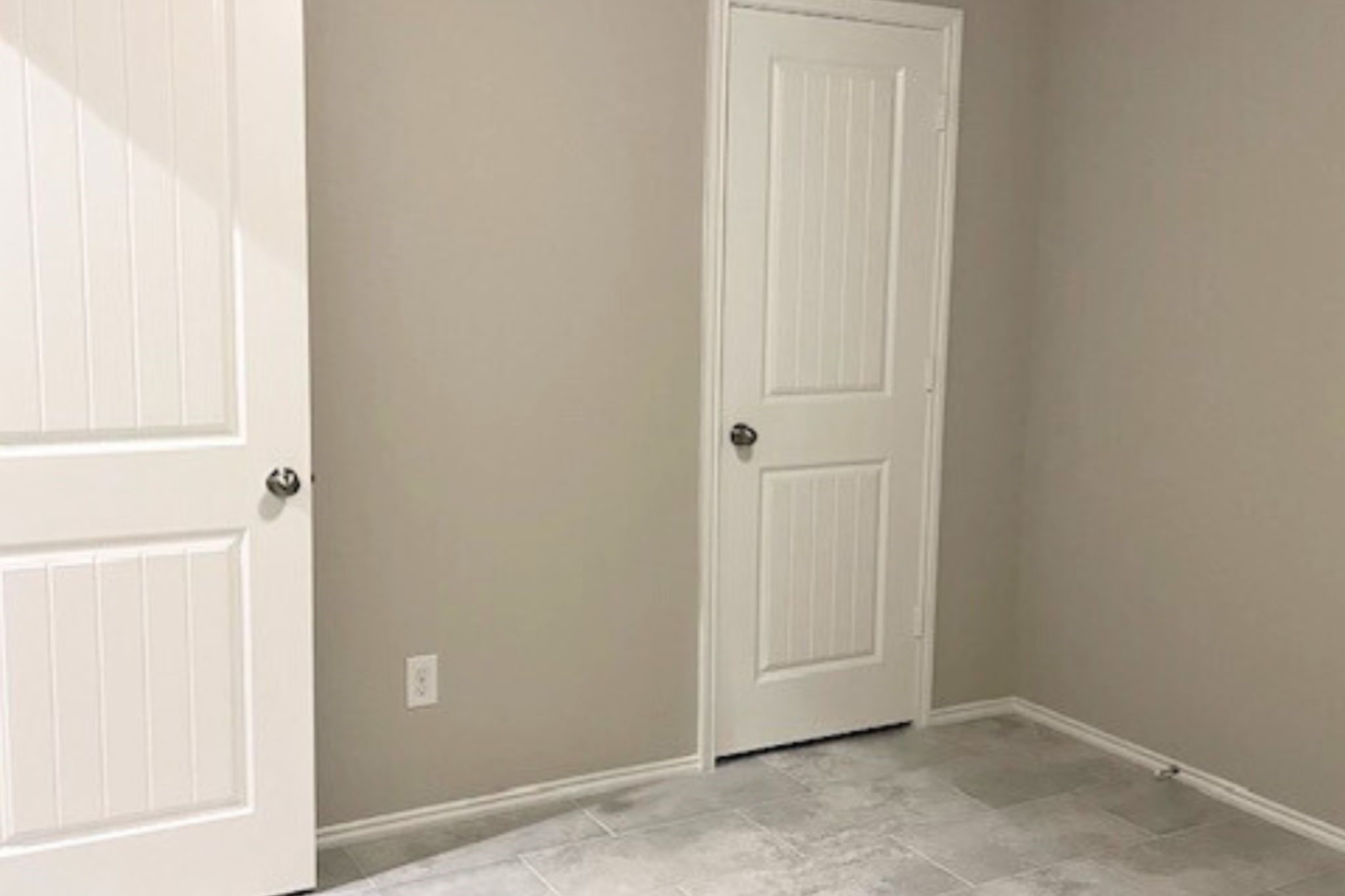 8310 Rose Petals Lane Rosharon, TX 77583 - Photo 21 of 43 Cozy secondary bedroom featuring tile flooring, neutral wall colors, and a window that brings in natural light. This versatile room can be used as a bedroom, guest room, or home office.