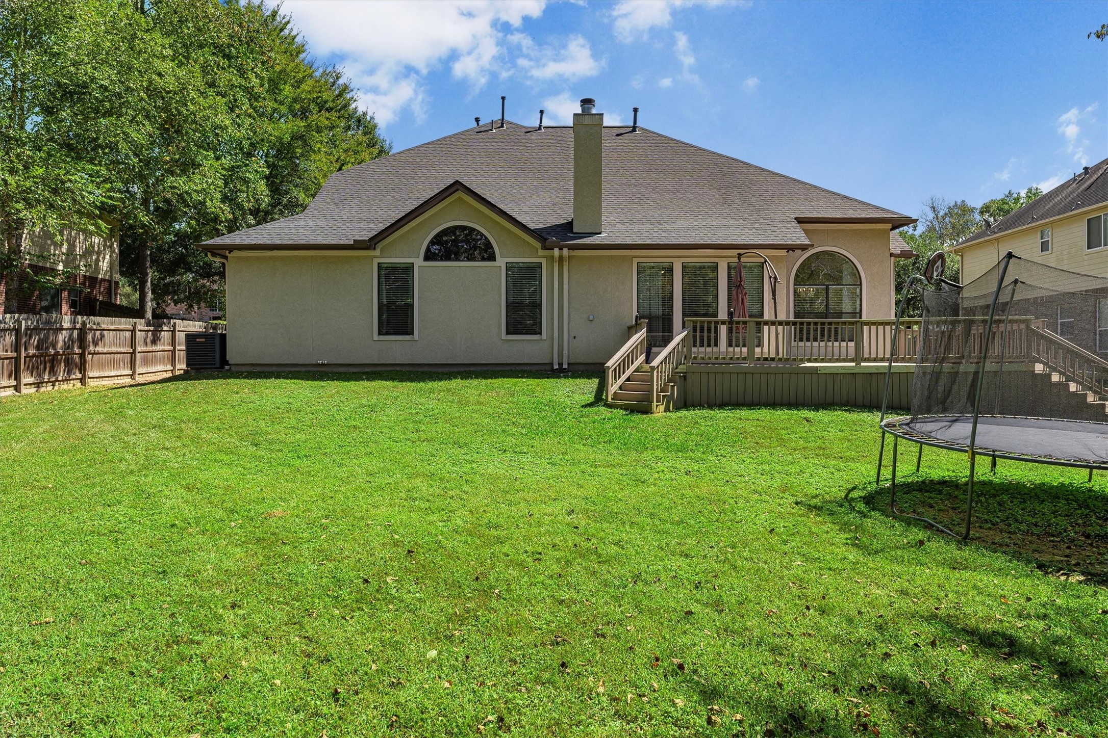 3517 Oak Landing Conroe, TX 77304 - Photo 28 of 28 a front view of a house with a yard