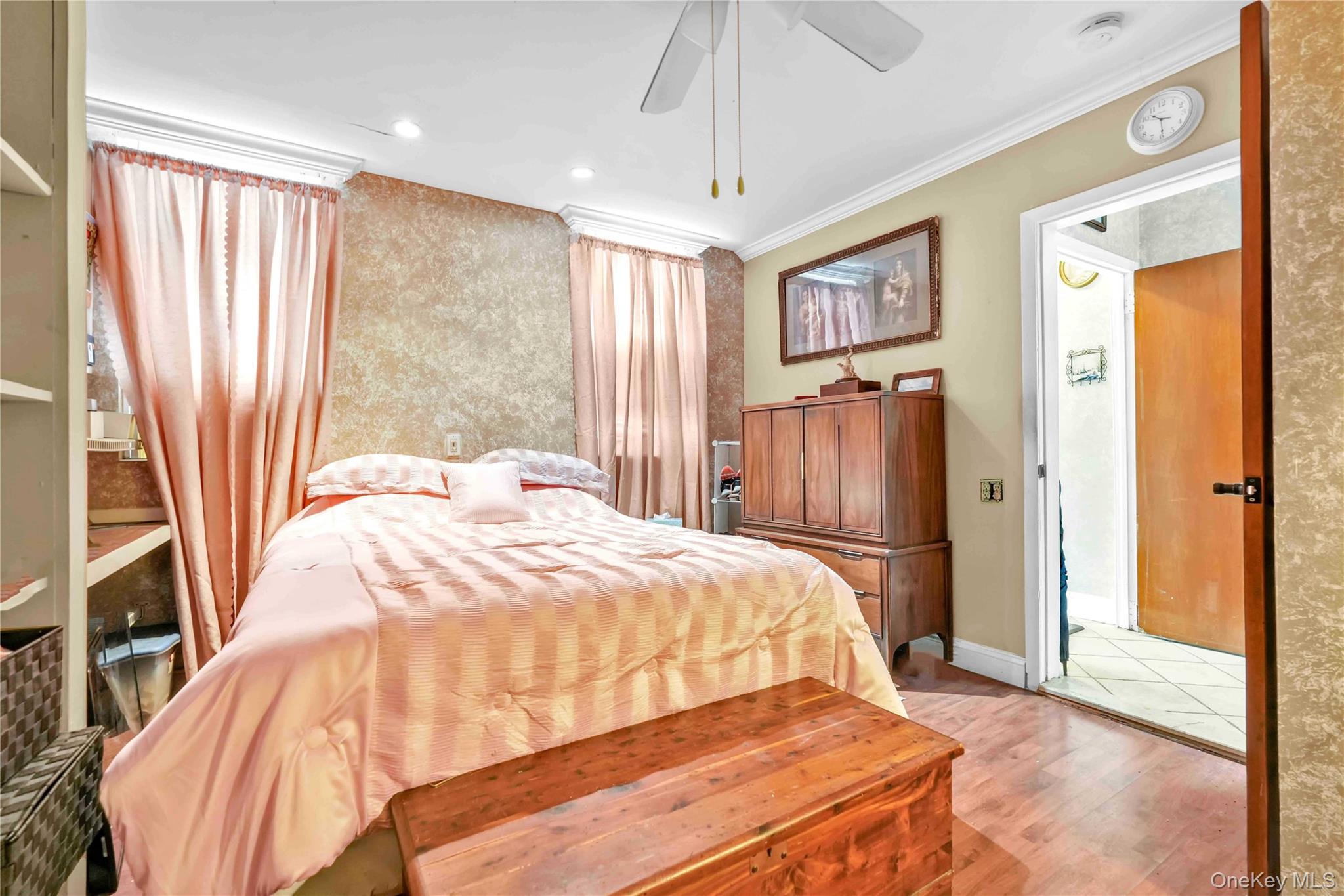1623 George Street Queens, NY 11385 - Photo 5 of 21 a bedroom with a bed and a window