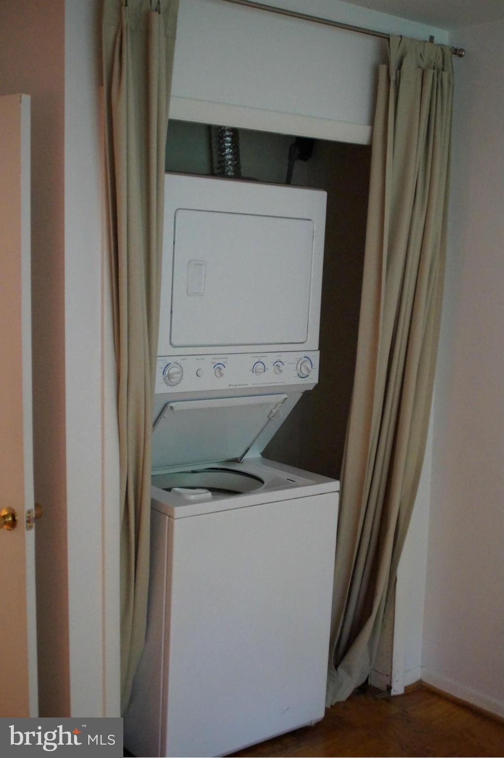 109 Cross Keys Road, Unit R109F Baltimore, MD 21210 - Photo 10 of 13 a utility room with dryer and washer