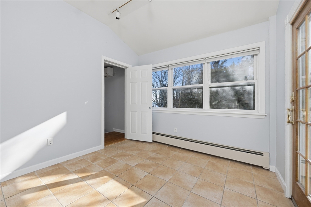 203 Endicott Avenue, Unit 2 Revere, MA 02151 - Photo 25 of 39 a view of an empty room with a window