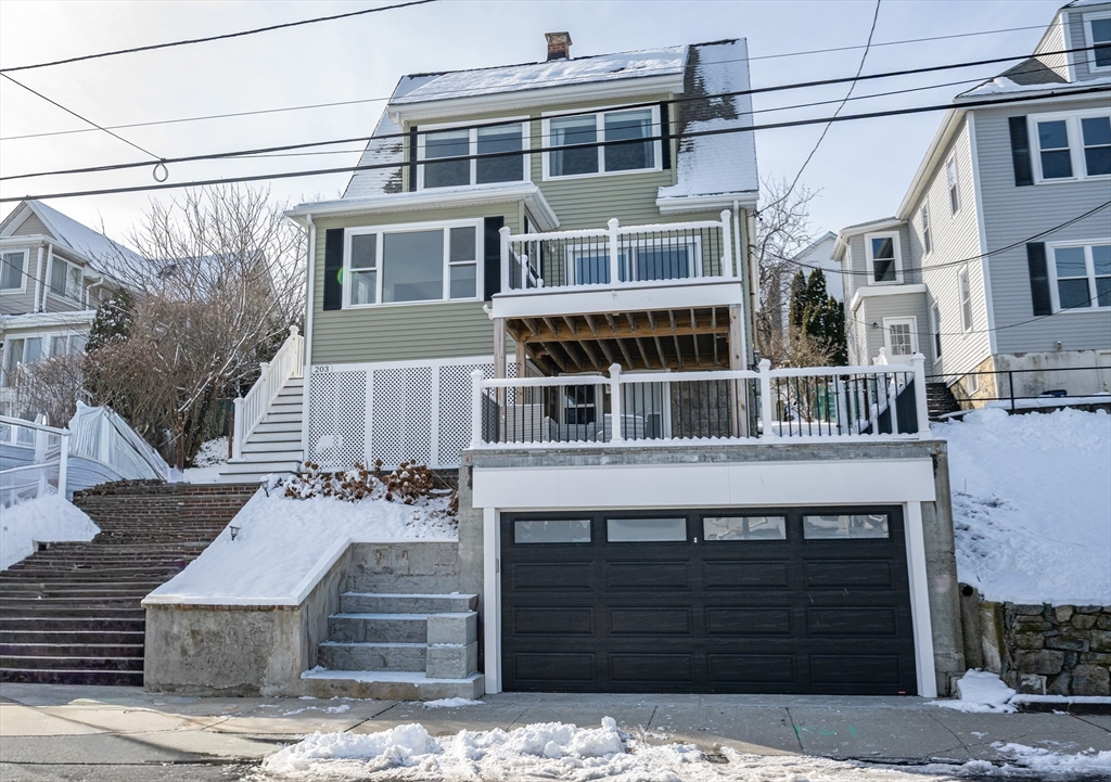 203 Endicott Avenue, Unit 2 Revere, MA 02151 - Photo 33 of 39 a front view of a house with a garden