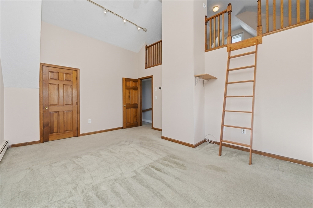 203 Endicott Avenue, Unit 2 Revere, MA 02151 - Photo 8 of 39 an empty room with windows