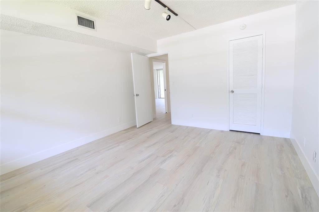 4007 North Cypress Drive, Unit 103 Pompano Beach, FL 33069 - Photo 16 of 25 a view of an empty room