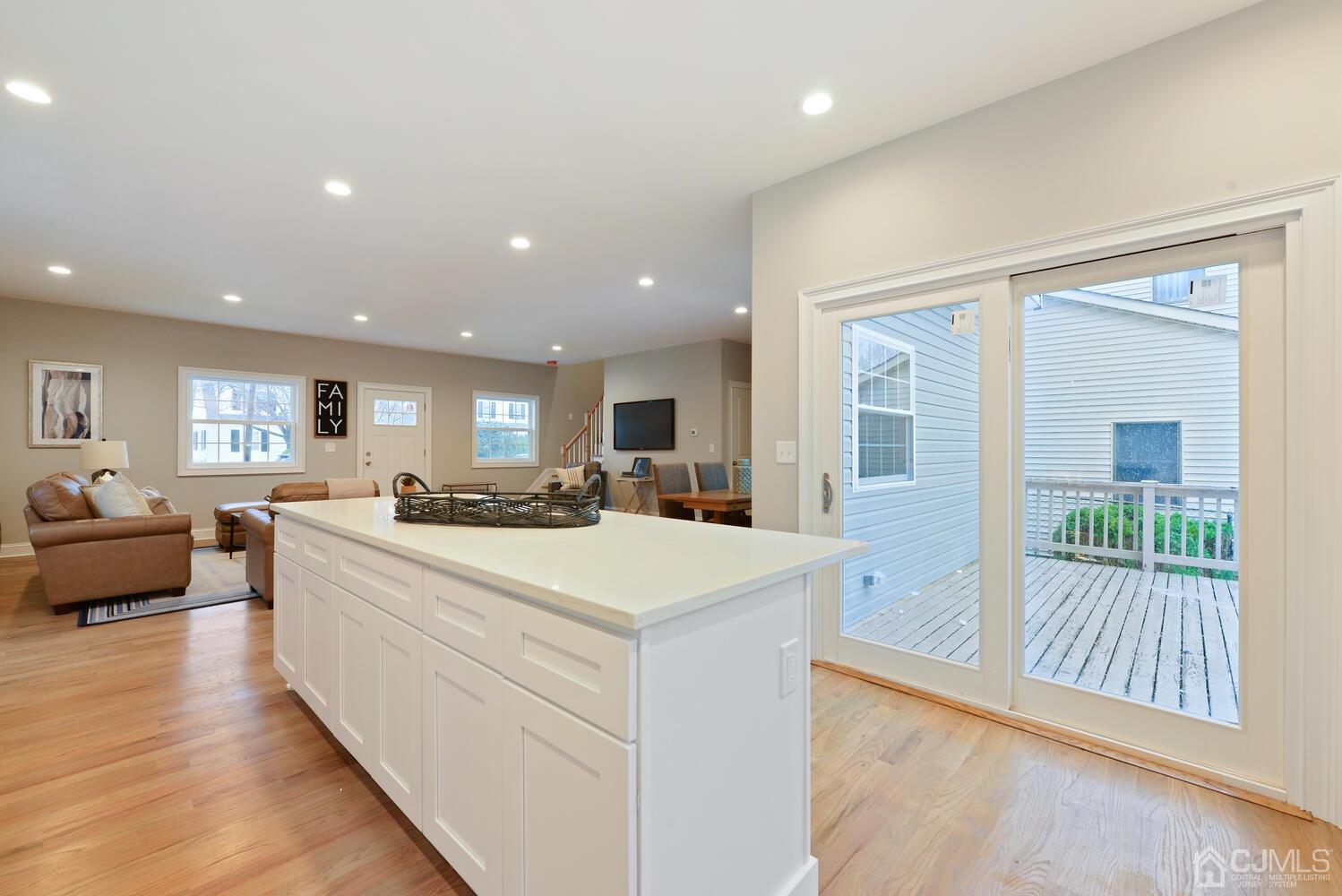 20 Sunset Drive Clark, NJ 07066 - Photo 11 of 32 a large white kitchen with a large window
