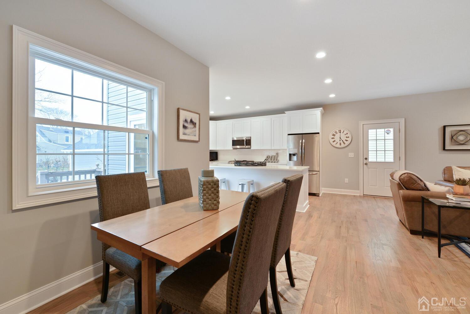 20 Sunset Drive Clark, NJ 07066 - Photo 14 of 32 a view of a dining room with furniture and windows