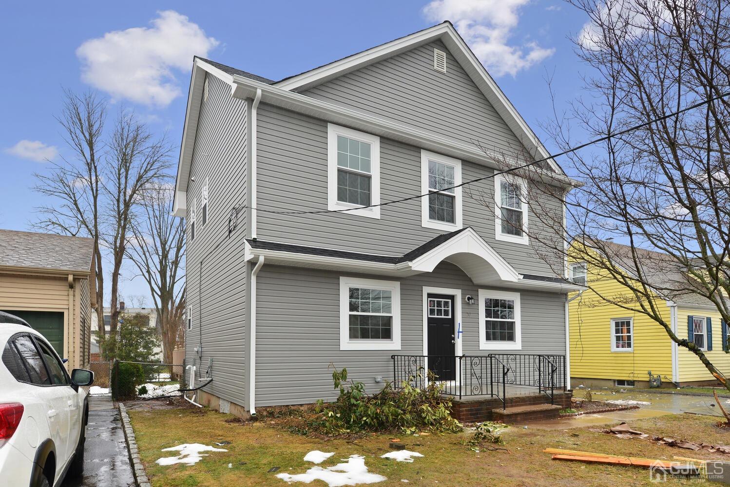 20 Sunset Drive Clark, NJ 07066 - Photo 2 of 32 a front view of a house with a yard