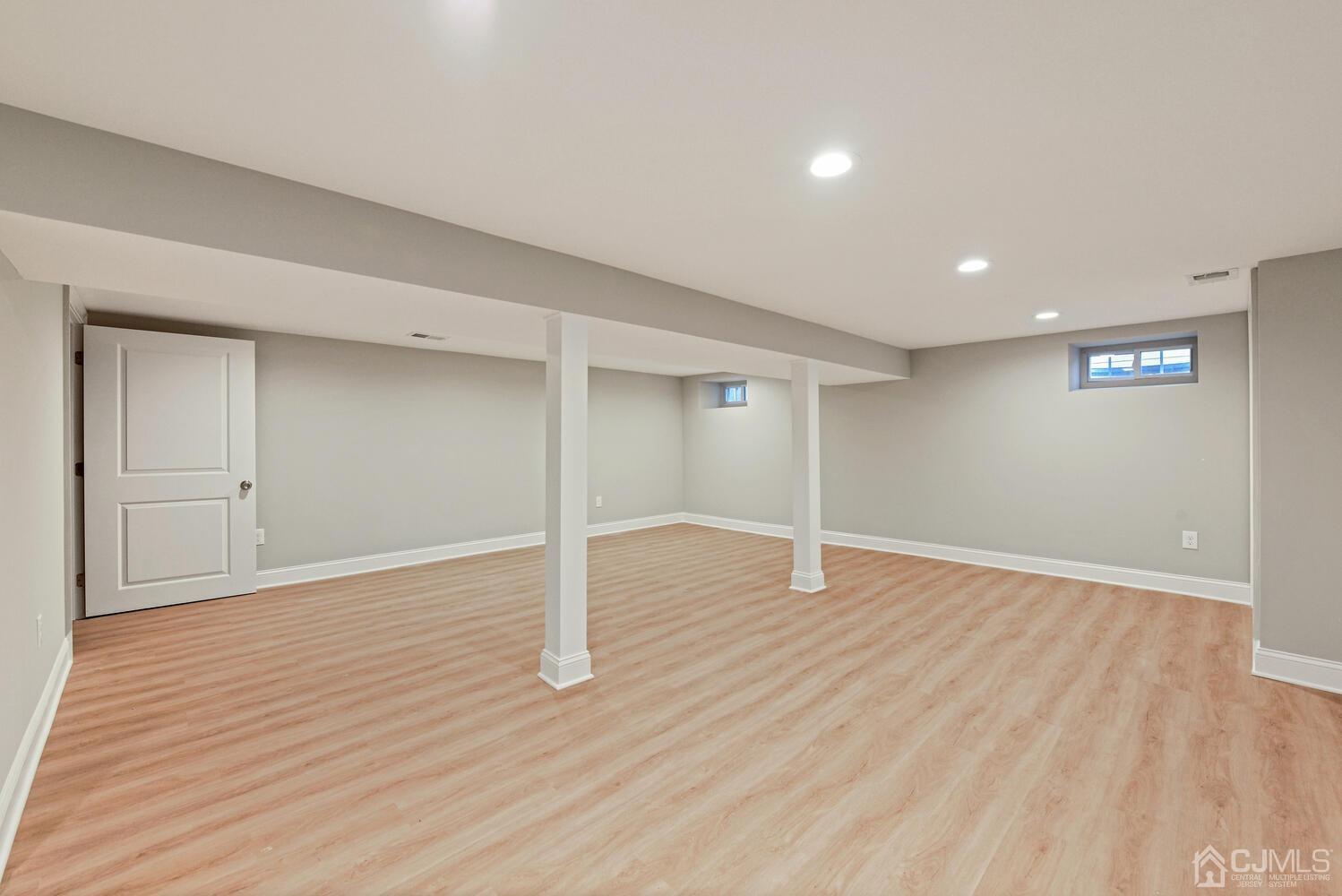 20 Sunset Drive Clark, NJ 07066 - Photo 27 of 32 a view of an empty room with wooden floor