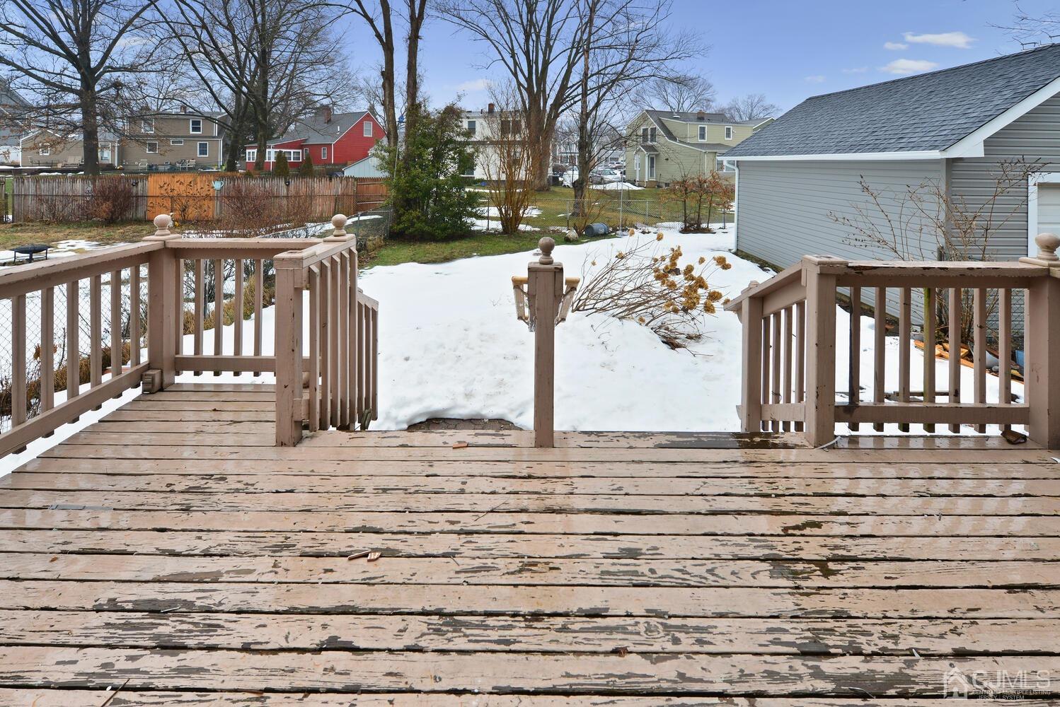 20 Sunset Drive Clark, NJ 07066 - Photo 30 of 32 a view of a house with a wooden bench