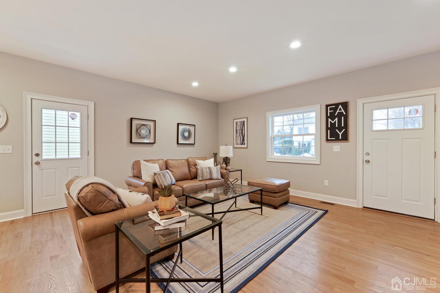 20 Sunset Drive Clark, NJ 07066 - Photo 8 of 32 a living room with furniture and wooden floor