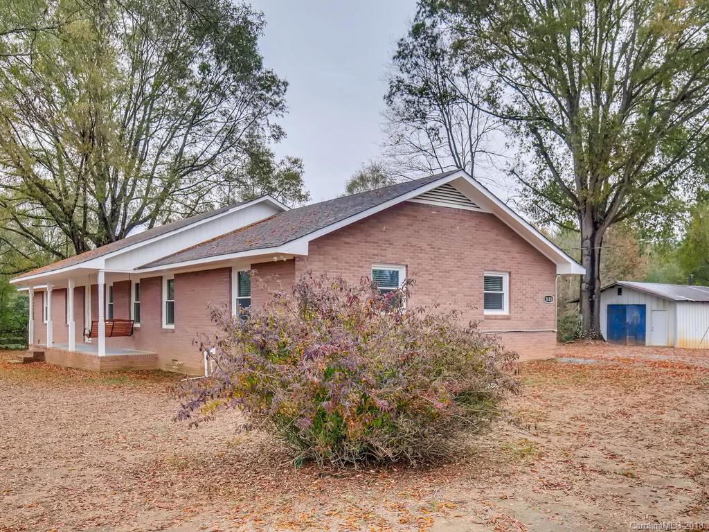 2411 Medlin Road Monroe, NC 28112 - Photo 2 of 27 front view of house with a yard
