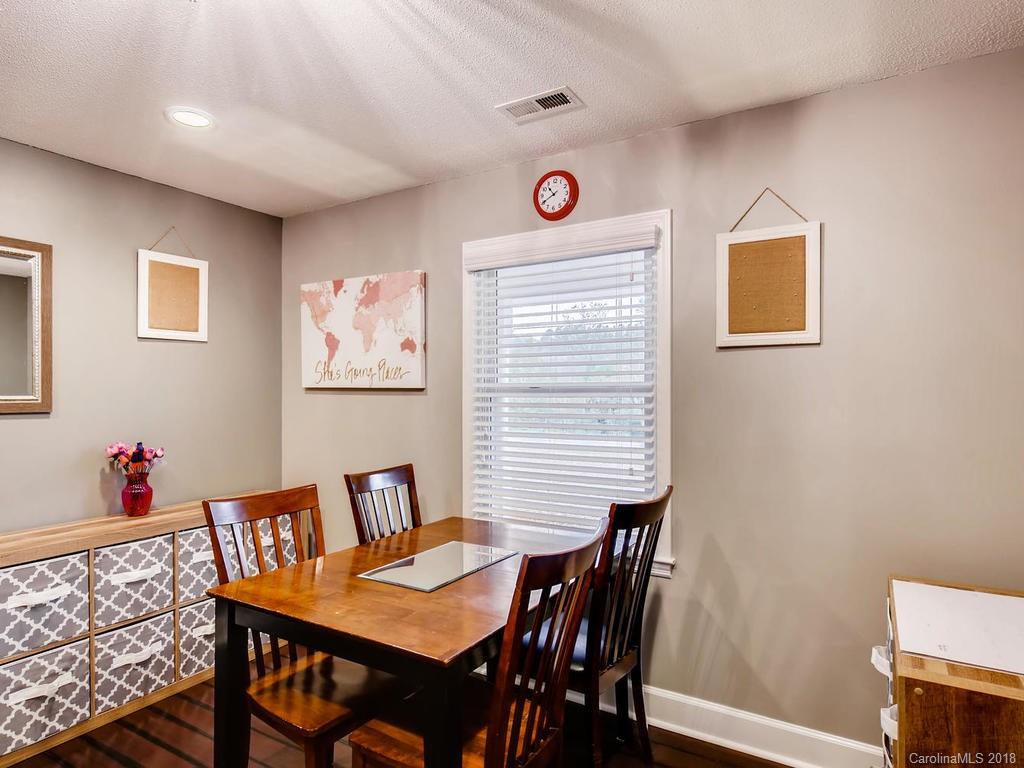 2411 Medlin Road Monroe, NC 28112 - Photo 14 of 27 a view of a dining room with furniture and window