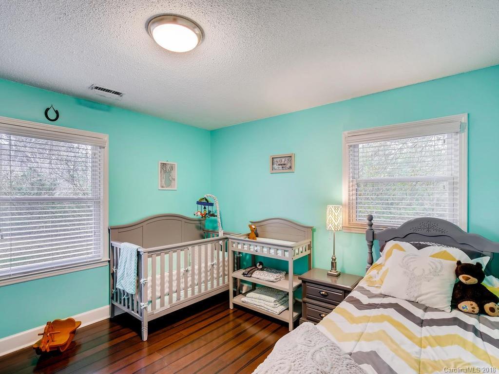 2411 Medlin Road Monroe, NC 28112 - Photo 19 of 27 a bedroom with furniture and a window