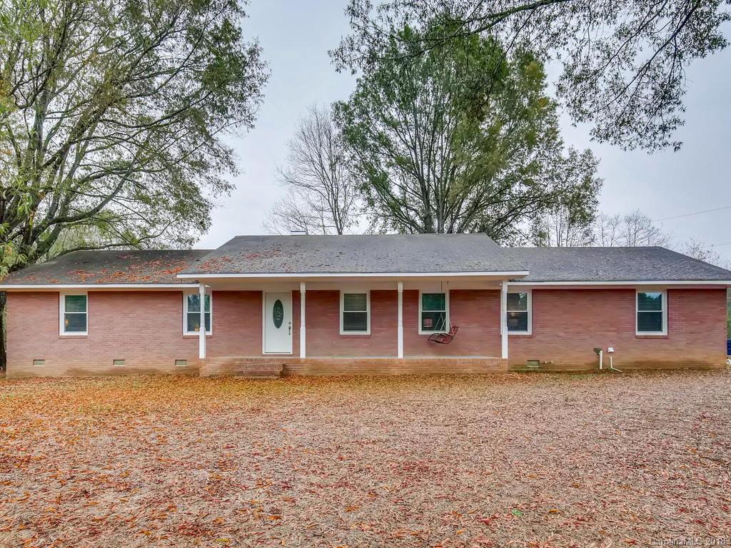 2411 Medlin Road Monroe, NC 28112 - Photo 3 of 27 front view of house with a yard
