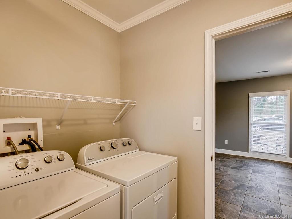 2411 Medlin Road Monroe, NC 28112 - Photo 22 of 27 a utility room with dryer and washer