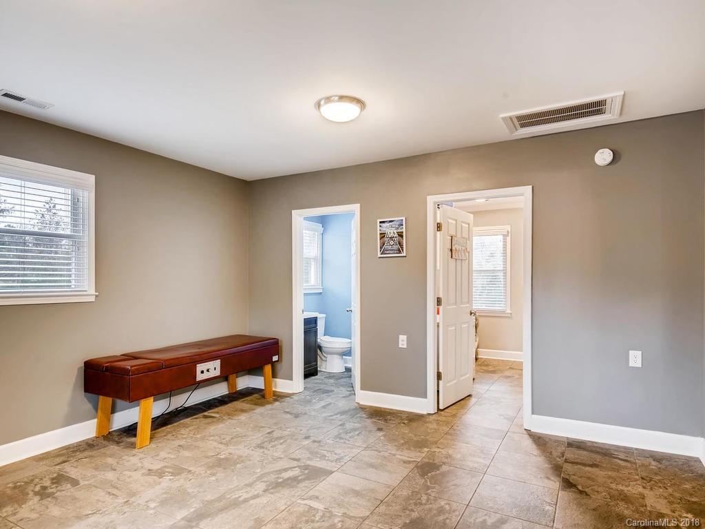 2411 Medlin Road Monroe, NC 28112 - Photo 23 of 27 a room with furniture and a window